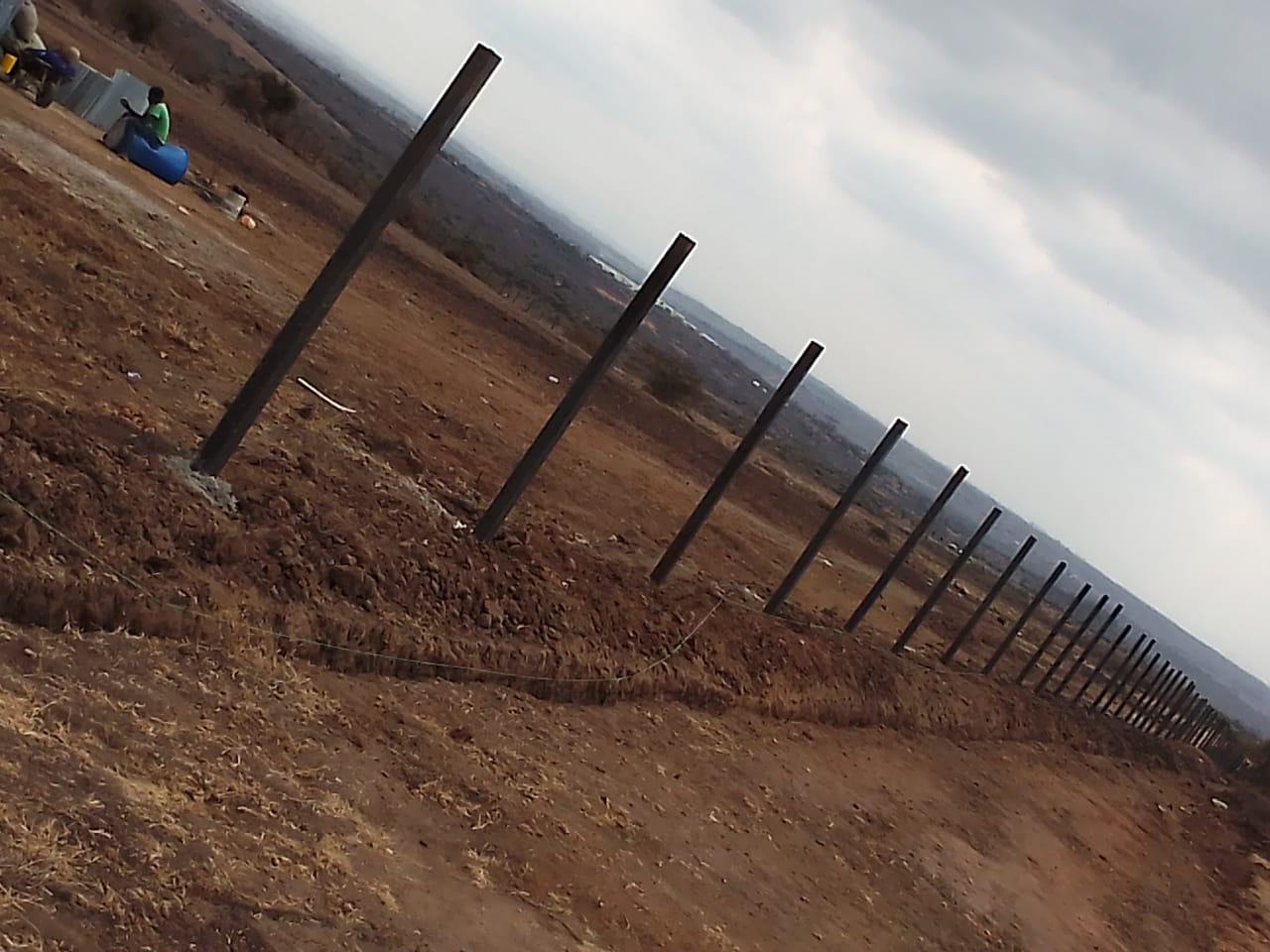 Recycled fencing posts installed in the field